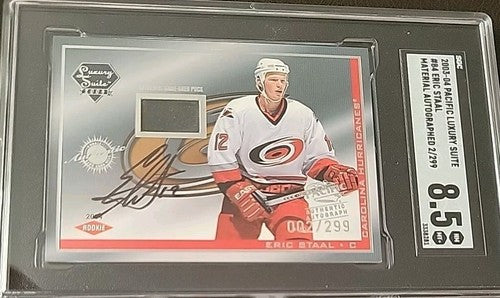 2003-04 Pacific Luxury Suite Auto Autograph Puck Rookie RC Eric Staal 002/299